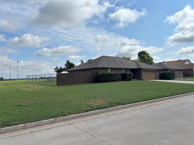 425 W Crooked Branch Way, Mustang, OK 73064 - view of property exterior featuring an attached garage and concrete driveway