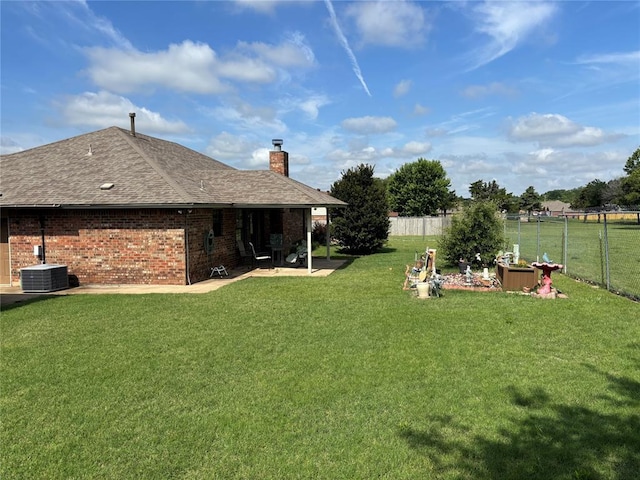 425 W Crooked Branch Way, Mustang, OK 73064 - fenced backyard featuring a patio
