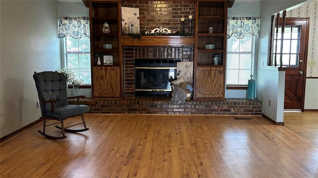 425 W Crooked Branch Way, Mustang, OK 73064 - living room featuring wood finished floors and a fireplace