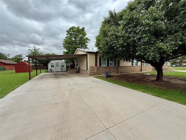 305 N Greer Ave, Duke, OK 73532 - view of front of property with concrete driveway, a front lawn, and an attached carport