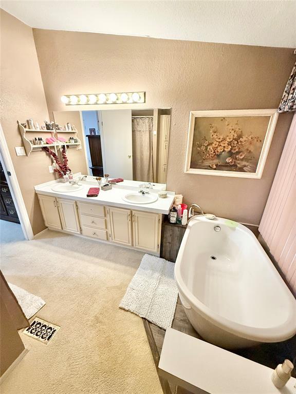 305 N Greer Ave, Duke, OK 73532 - full bath with double vanity and a bathtub
