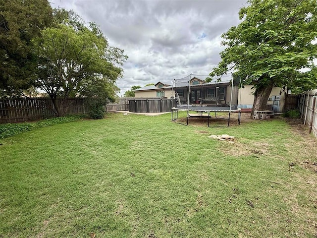 305 N Greer Ave, Duke, OK 73532 - view of yard featuring a trampoline