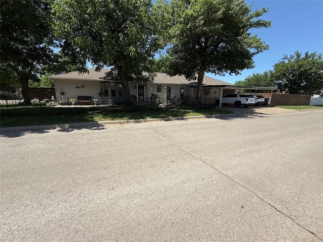 view of front of house featuring a carport