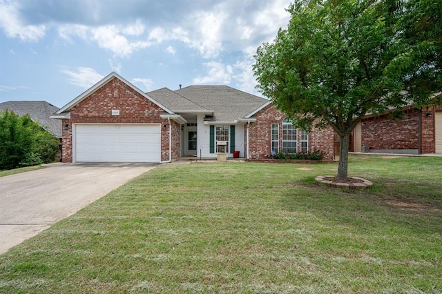 11014 Madison Ave, Midwest City, OK 73130 - view of front of property featuring an attached garage, brick siding, driveway, and a front lawn