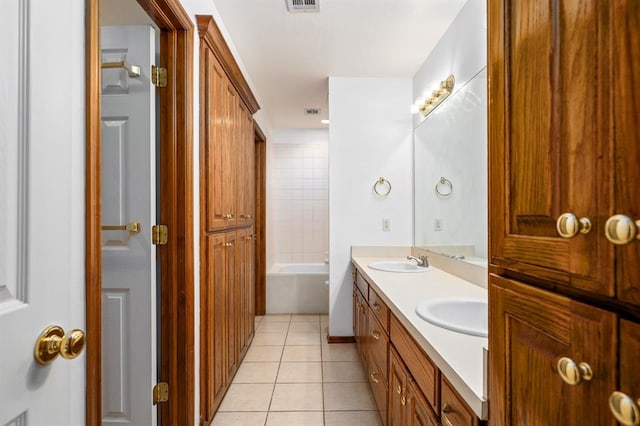 11014 Madison Ave, Midwest City, OK 73130 - full bath featuring double vanity, tile patterned floors, and bathtub / shower combination