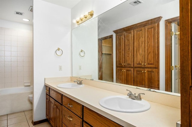 11014 Madison Ave, Midwest City, OK 73130 - bathroom featuring double vanity, tile patterned floors, toilet, and  shower combination