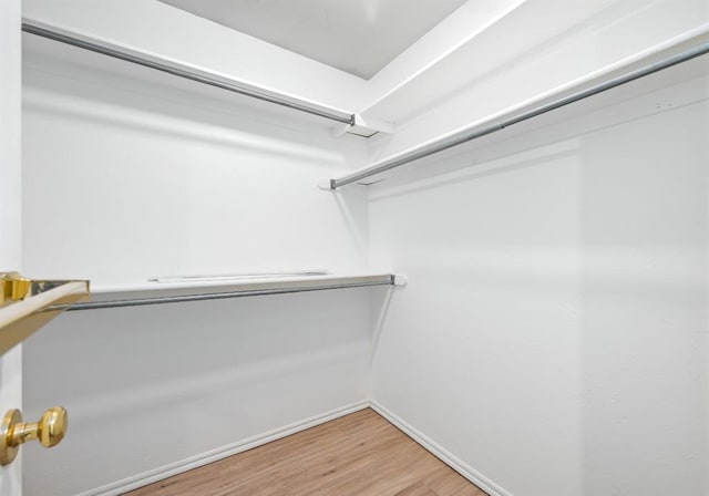 11014 Madison Ave, Midwest City, OK 73130 - spacious closet featuring light wood finished floors