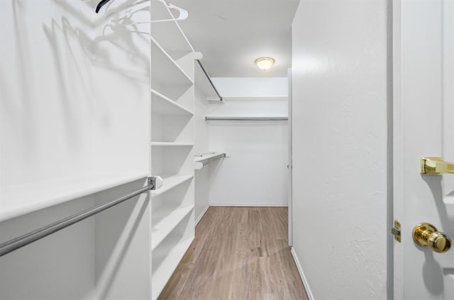 11014 Madison Ave, Midwest City, OK 73130 - spacious closet with wood finished floors