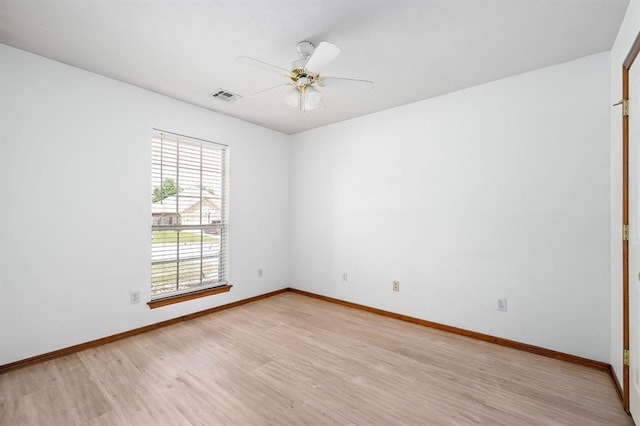 11014 Madison Ave, Midwest City, OK 73130 - empty room with light wood-style flooring, baseboards, and a ceiling fan