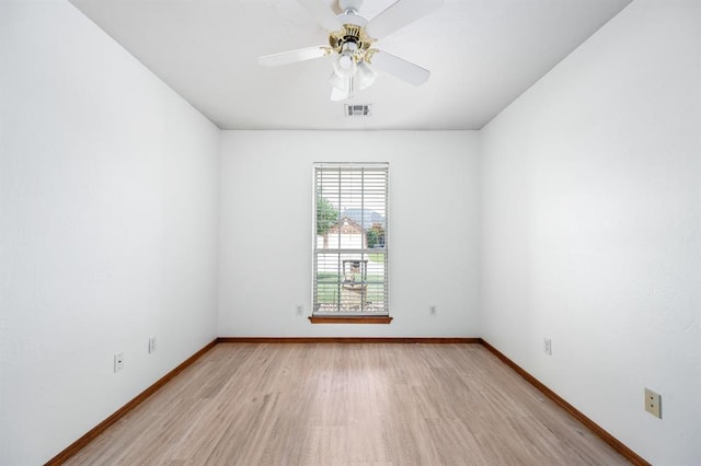 11014 Madison Ave, Midwest City, OK 73130 - spare room with light wood finished floors, baseboards, and ceiling fan