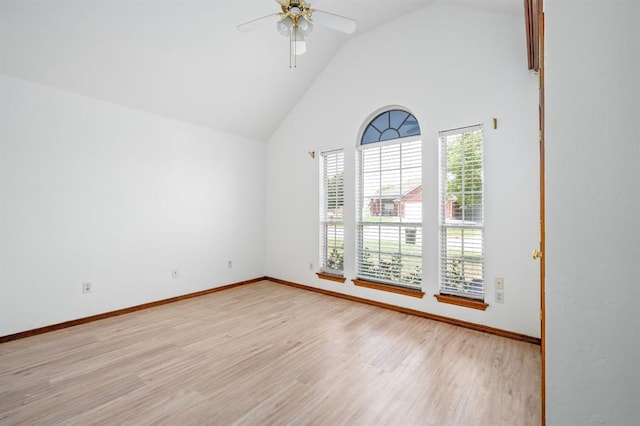 11014 Madison Ave, Midwest City, OK 73130 - unfurnished room featuring light wood-style floors, ceiling fan, baseboards, and high vaulted ceiling