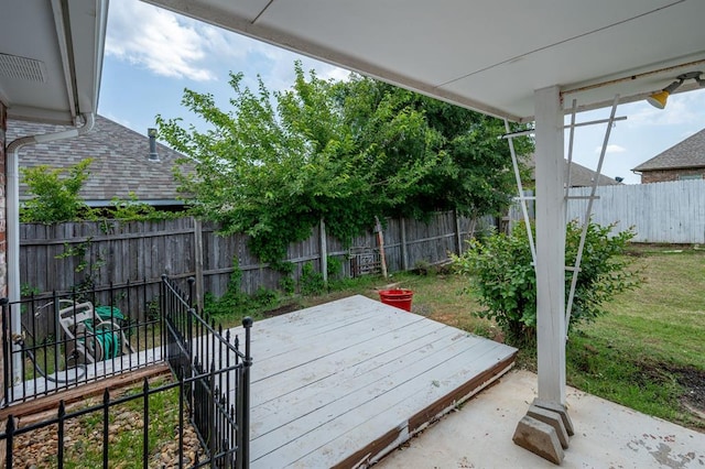 11014 Madison Ave, Midwest City, OK 73130 - wooden deck with a fenced backyard