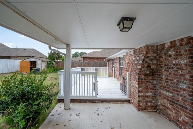 11014 Madison Ave, Midwest City, OK 73130 - fenced backyard featuring a patio and a deck
