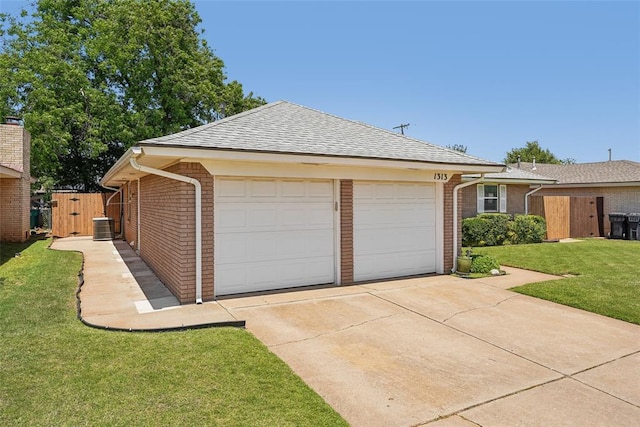 1313 SW 69th St, Oklahoma City, OK 73159 - view of front of house with brick siding, roof with shingles, a gate, and central air condition unit