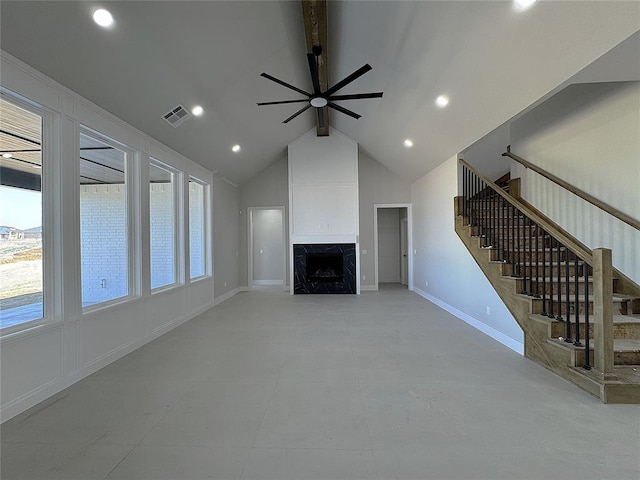 7217 NW 154th St, Edmond, OK 73013 - unfurnished living room with beam ceiling, ceiling fan, stairs, a fireplace, and baseboards