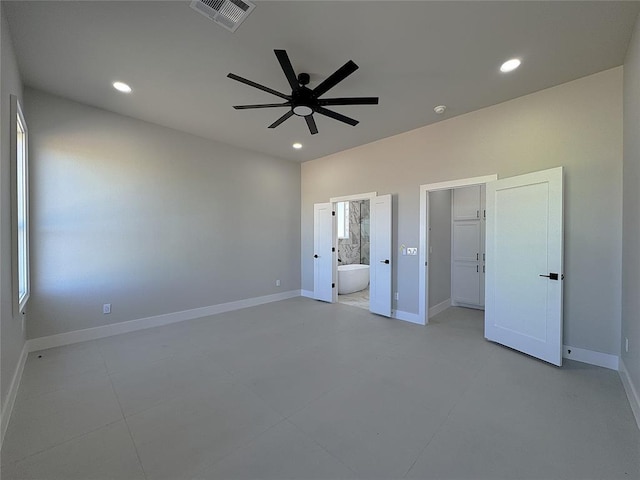 7217 NW 154th St, Edmond, OK 73013 - unfurnished bedroom featuring recessed lighting, ensuite bathroom, baseboards, and ceiling fan