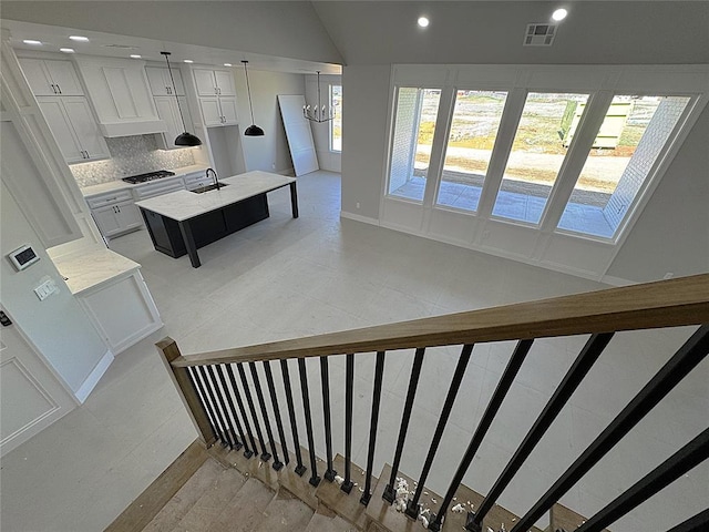 7217 NW 154th St, Edmond, OK 73013 - stairs featuring plenty of natural light and recessed lighting