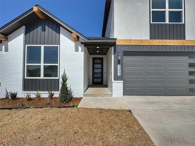 7217 NW 154th St, Edmond, OK 73013 - view of front of house featuring brick siding, driveway, and an attached garage