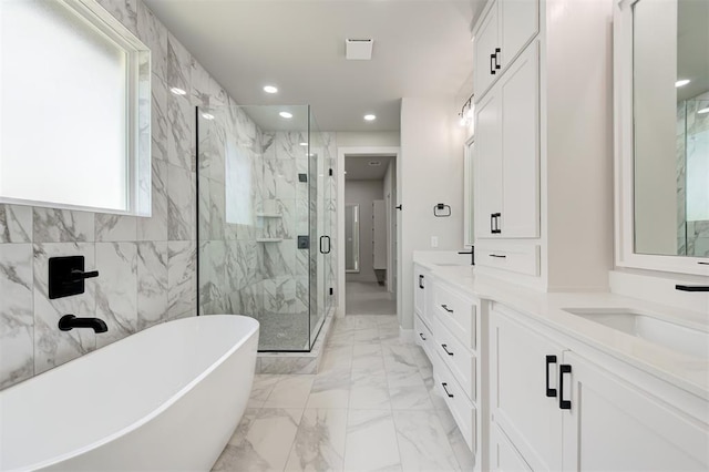 7217 NW 154th St, Edmond, OK 73013 - full bathroom with vanity, a marble finish shower, a soaking tub, marble finish flooring, and recessed lighting