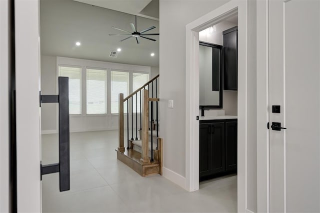 7217 NW 154th St, Edmond, OK 73013 - hallway featuring stairs, recessed lighting, and light tile patterned flooring