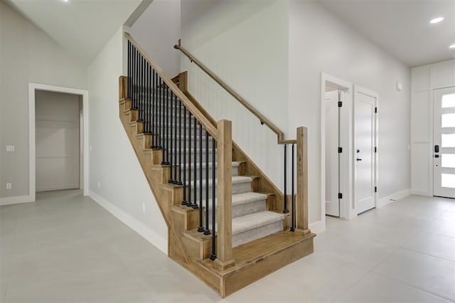 7217 NW 154th St, Edmond, OK 73013 - foyer with stairway, recessed lighting, and light tile patterned flooring
