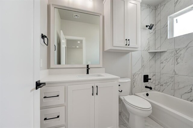 7217 NW 154th St, Edmond, OK 73013 - bathroom with marble look tile flooring, vanity, and shower / bathtub combination