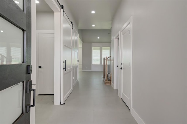 7217 NW 154th St, Edmond, OK 73013 - corridor featuring recessed lighting and a barn door