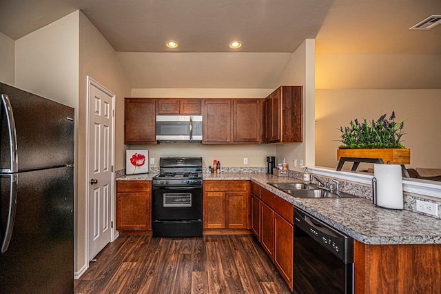 1701 Cambridge Row, The Village, OK 73120 - kitchen featuring black appliances, a sink, dark wood-style floors, lofted ceiling, and recessed lighting