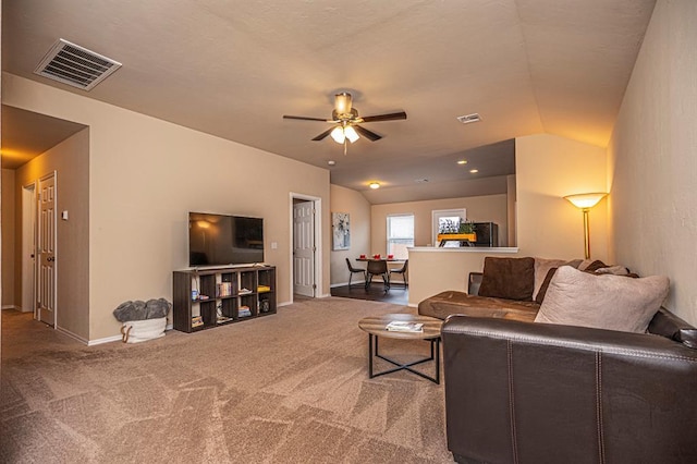 1701 Cambridge Row, The Village, OK 73120 - living area with carpet, lofted ceiling, ceiling fan, and baseboards