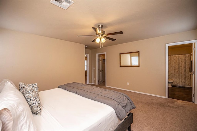 1701 Cambridge Row, The Village, OK 73120 - carpeted bedroom featuring baseboards, connected bathroom, a spacious closet, and ceiling fan