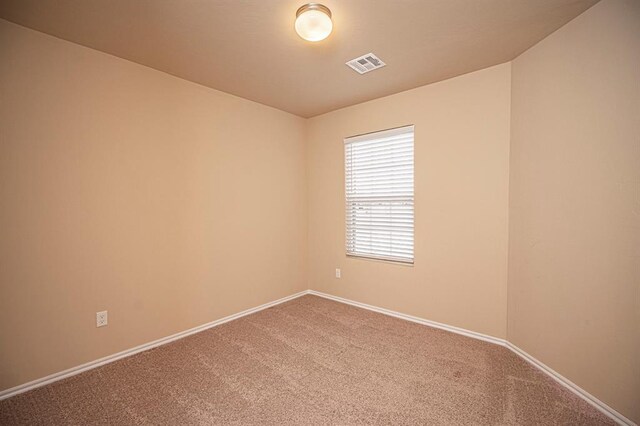 1701 Cambridge Row, The Village, OK 73120 - carpeted spare room with baseboards