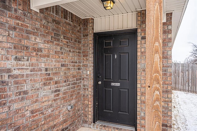 1701 Cambridge Row, The Village, OK 73120 - doorway to property with brick siding and board and batten siding