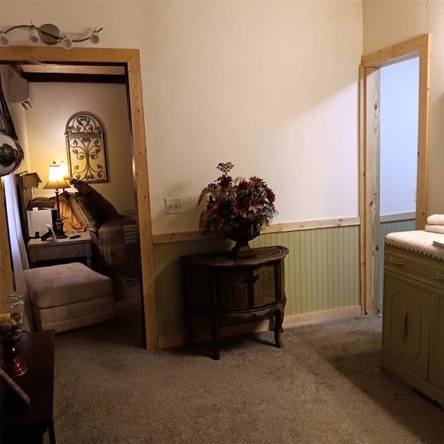 300 Bayberry Rd, Broken Bow, OK 74728 - hallway featuring wainscoting, carpet flooring, and a wall unit AC