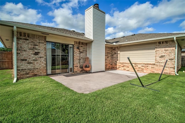2416 Northwood Ln, Edmond, OK 73013 - rear view of property with a patio area, a chimney, and brick siding