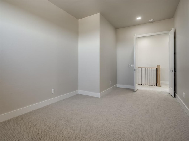 6305 NW 153rd St, Edmond, OK 73013 - empty room featuring light colored carpet, recessed lighting, and a smoke detector