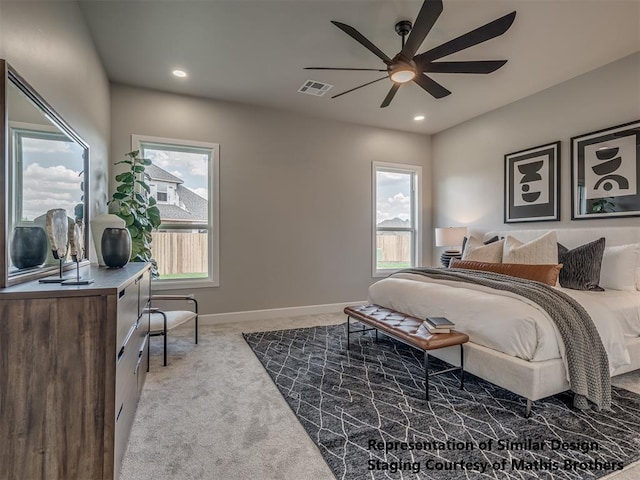6305 NW 153rd St, Edmond, OK 73013 - bedroom with multiple windows, carpet, and recessed lighting