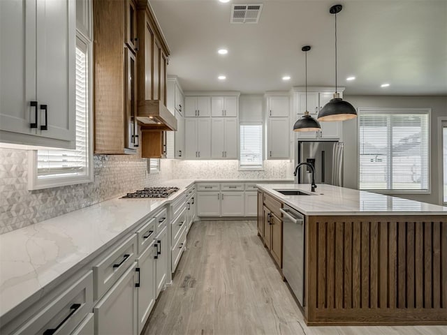 6305 NW 153rd St, Edmond, OK 73013 - kitchen featuring stainless steel appliances, healthy amount of natural light, backsplash, and recessed lighting
