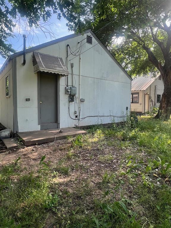 303 Grove St, Perry, OK 73077 - view of rear view of house