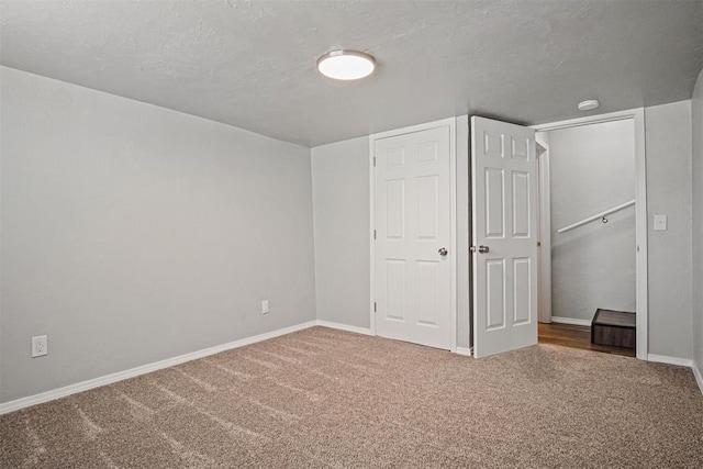 417 Russell Dr, Midwest City, OK 73110 - unfurnished bedroom featuring carpet flooring and baseboards