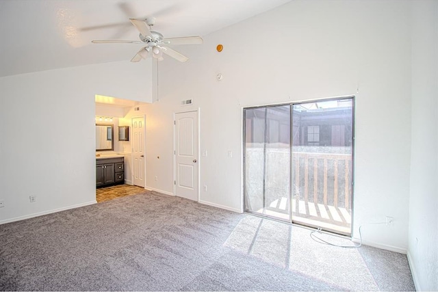 400 Timberwind Rd, Edmond, OK 73034 - unfurnished room featuring light colored carpet, high vaulted ceiling, a ceiling fan, and baseboards