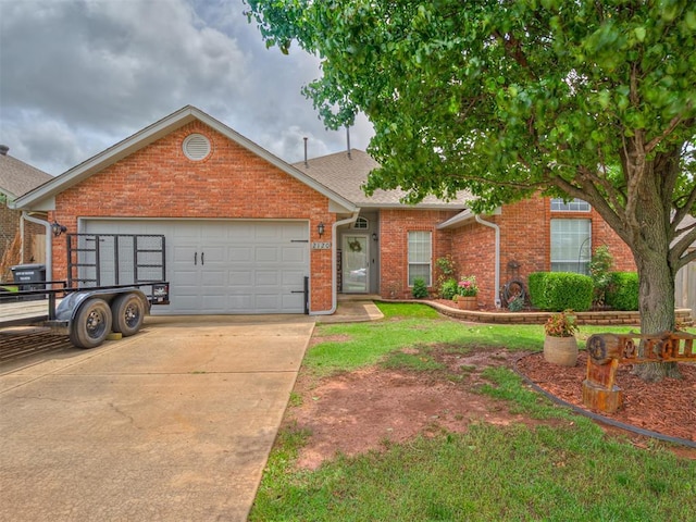 2120 NE 4th St, Moore, OK 73160 - single story home with brick siding, driveway, an attached garage, and a shingled roof