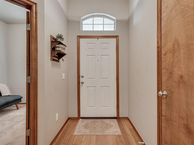 2120 NE 4th St, Moore, OK 73160 - entrance foyer featuring light wood finished floors and baseboards