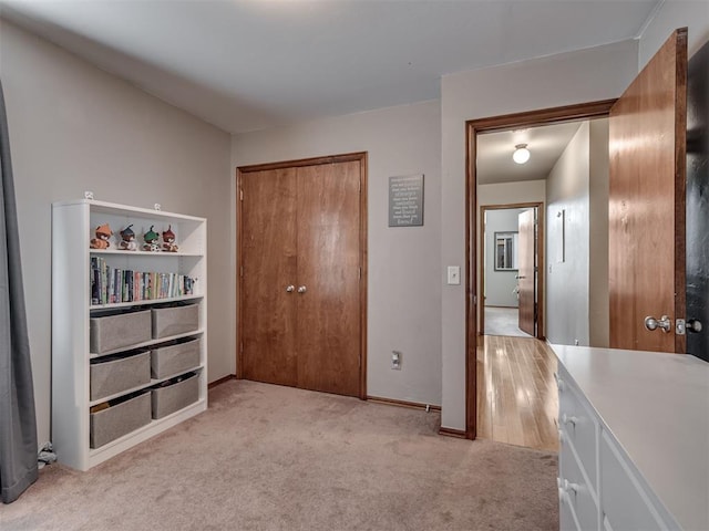 2120 NE 4th St, Moore, OK 73160 - unfurnished bedroom featuring light colored carpet, a closet, and baseboards