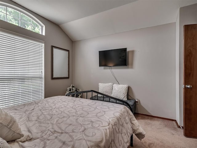 2120 NE 4th St, Moore, OK 73160 - bedroom featuring carpet floors, lofted ceiling, and baseboards
