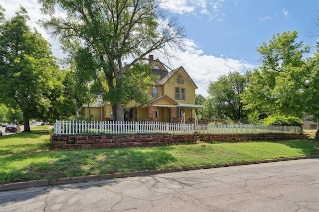 624 N Wentz St, Guthrie, OK 73044 - victorian home with a porch and a chimney