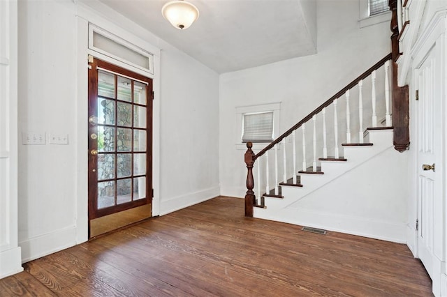 624 N Wentz St, Guthrie, OK 73044 - foyer featuring wood finished floors, stairs, and baseboards