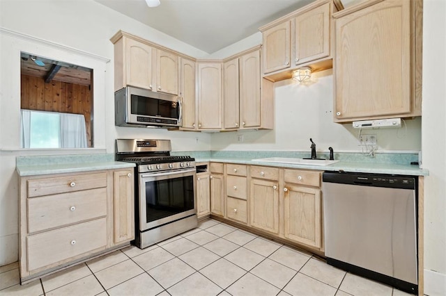 624 N Wentz St, Guthrie, OK 73044 - kitchen with appliances with stainless steel finishes, light brown cabinetry, and a sink