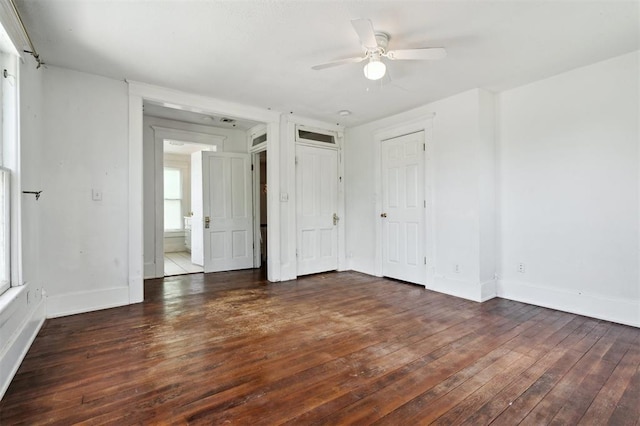 624 N Wentz St, Guthrie, OK 73044 - unfurnished bedroom featuring hardwood / wood-style flooring, baseboards, and a ceiling fan