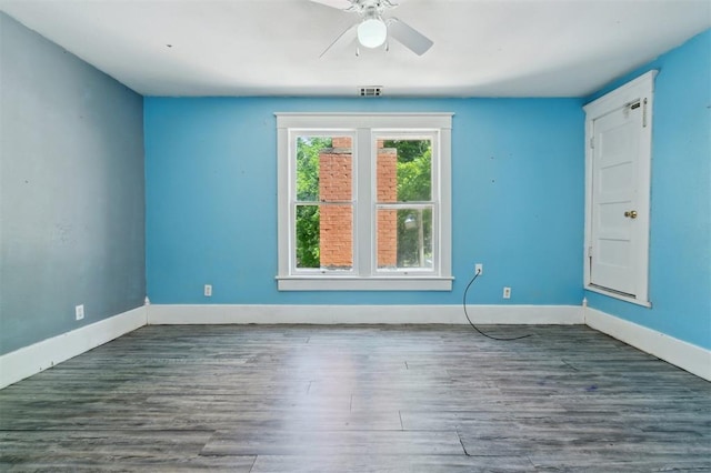 624 N Wentz St, Guthrie, OK 73044 - spare room featuring a ceiling fan, baseboards, and wood finished floors