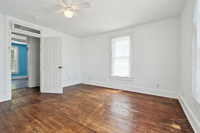 624 N Wentz St, Guthrie, OK 73044 - unfurnished room featuring hardwood / wood-style floors, a ceiling fan, baseboards, and a smoke detector
